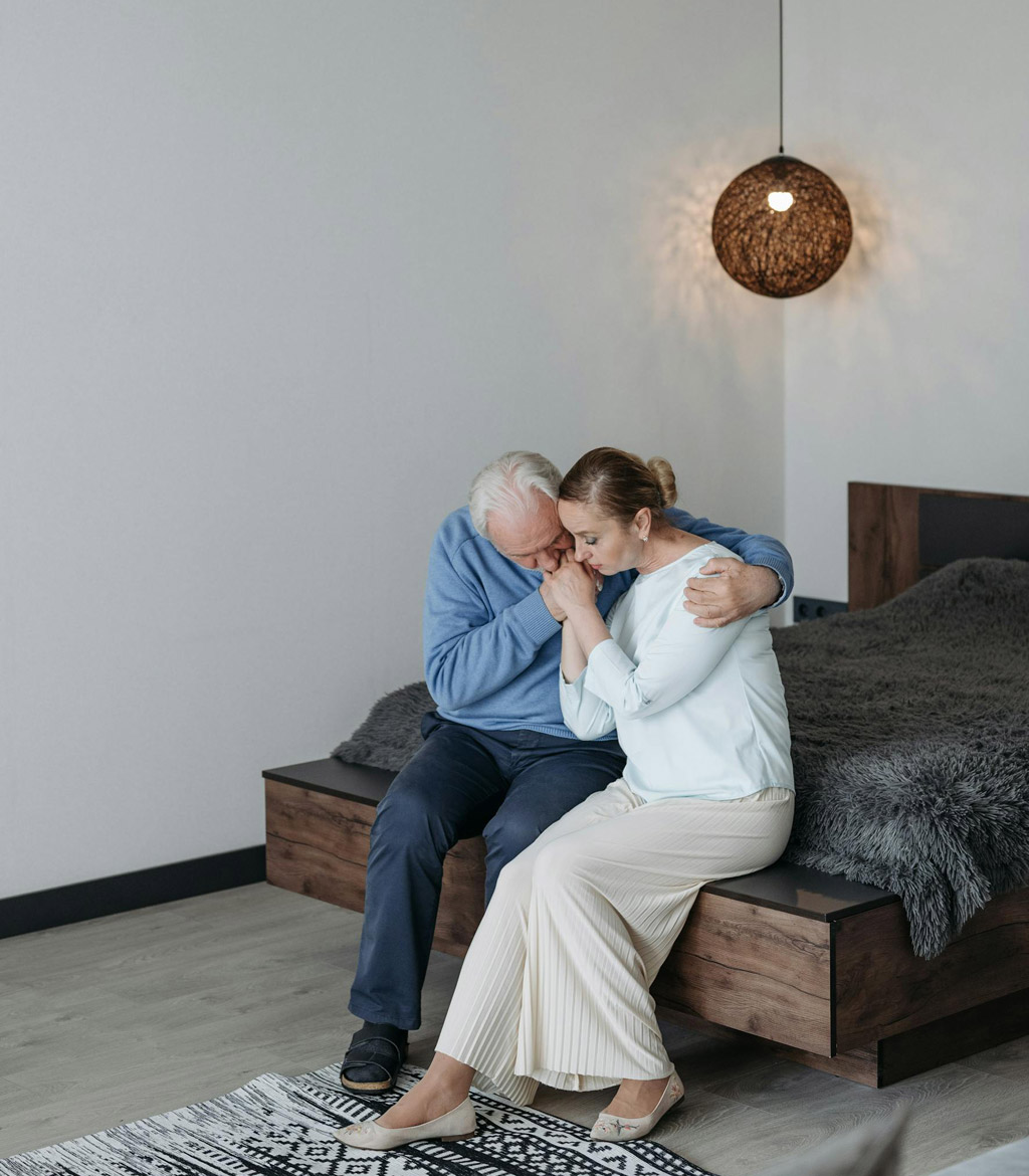 Couple grieving together and supporting each other